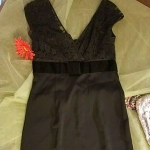 Black lace and velvet surplice top satin dress